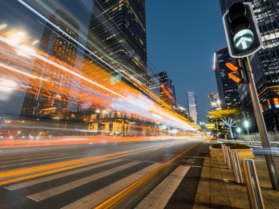 Long exposure photograph of city traffic at night in an urban environment