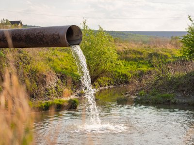 pipe discharging wastewater into nature